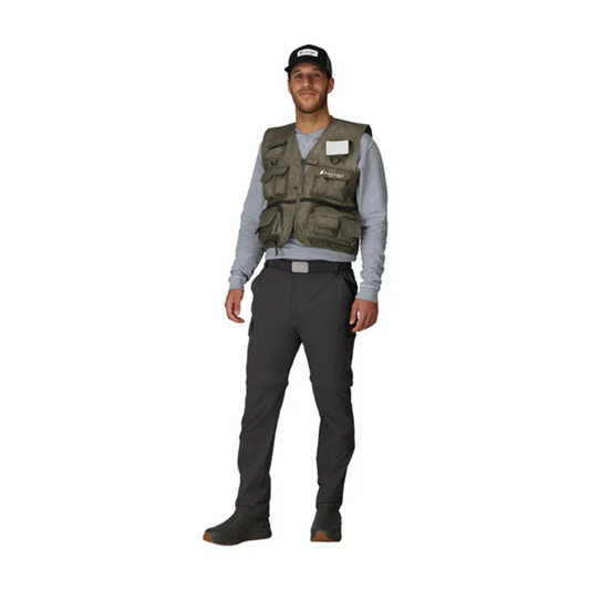 Man wearing a green vest and black pants on a white background
