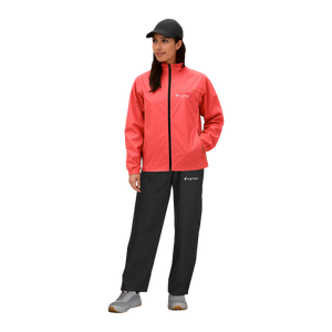 Person wearing a pink raincoat and black pants on a white background