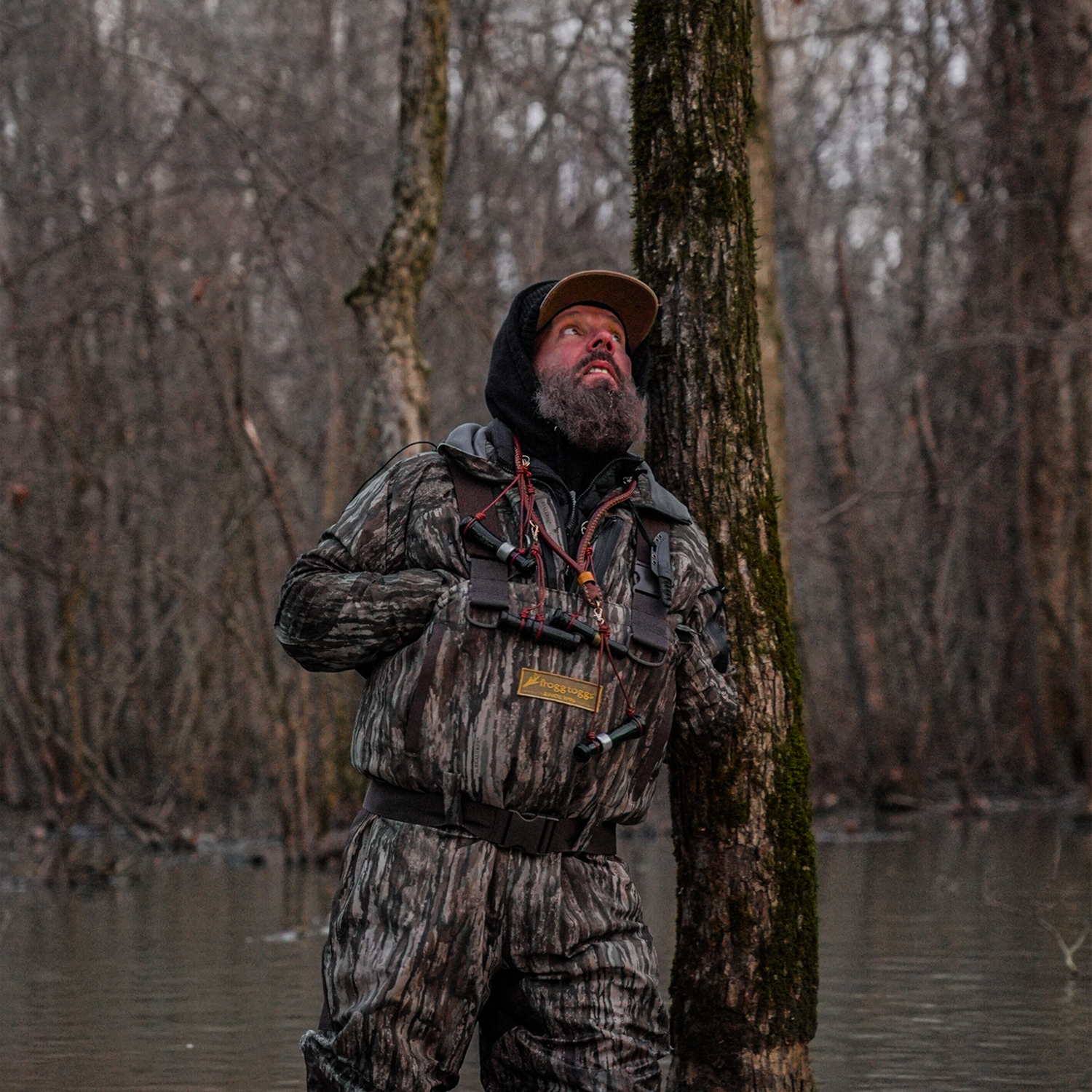 Image of man fly fishing wearing a pair frogg toggs waders.