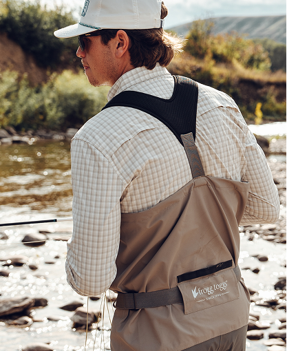 Image of man fly fishing wearing a pair frogg toggs waders.