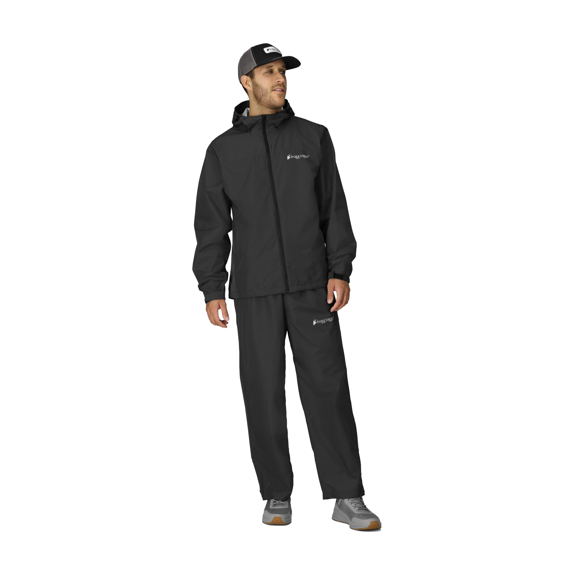 Man wearing a black raincoat and pants with a cap on a white background