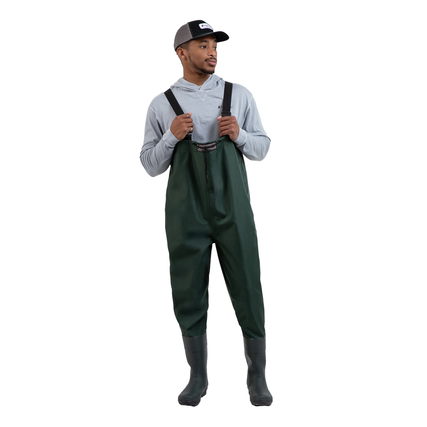 Man wearing green lug sole wader 