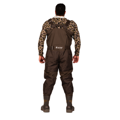 A man viewed from the back wearing brown waders over a long-sleeve camouflage shirt, standing against a plain white background.