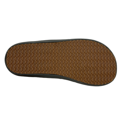 Brown shoe sole with wavy pattern on a white background