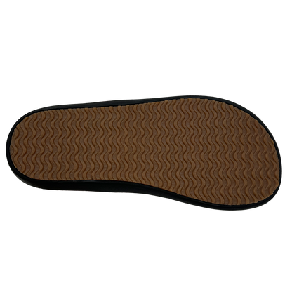 Brown shoe sole with wavy pattern on a white background