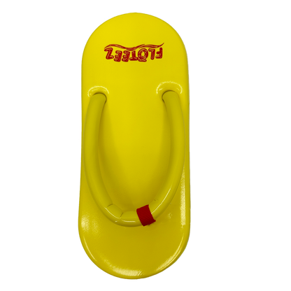 Yellow sandal with red accents on a white background