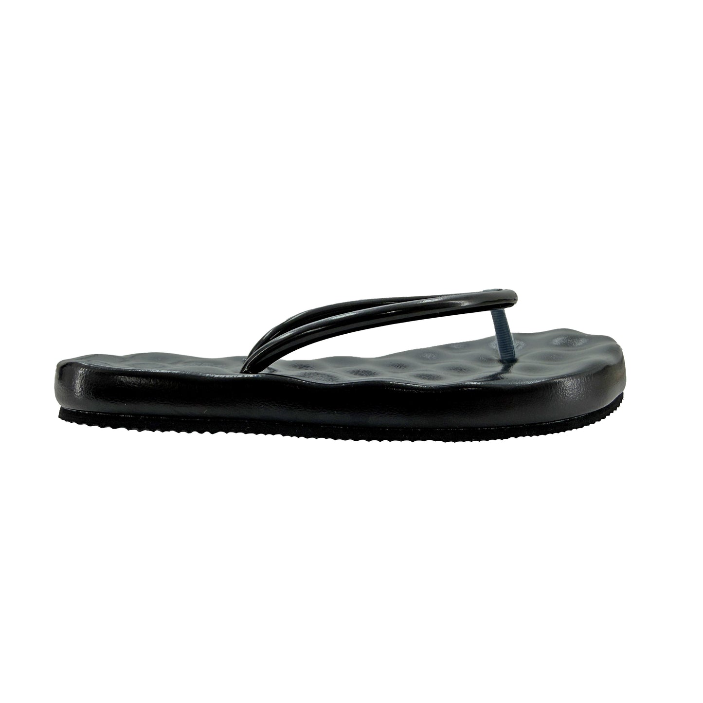 Black sandal with a textured sole on a white background