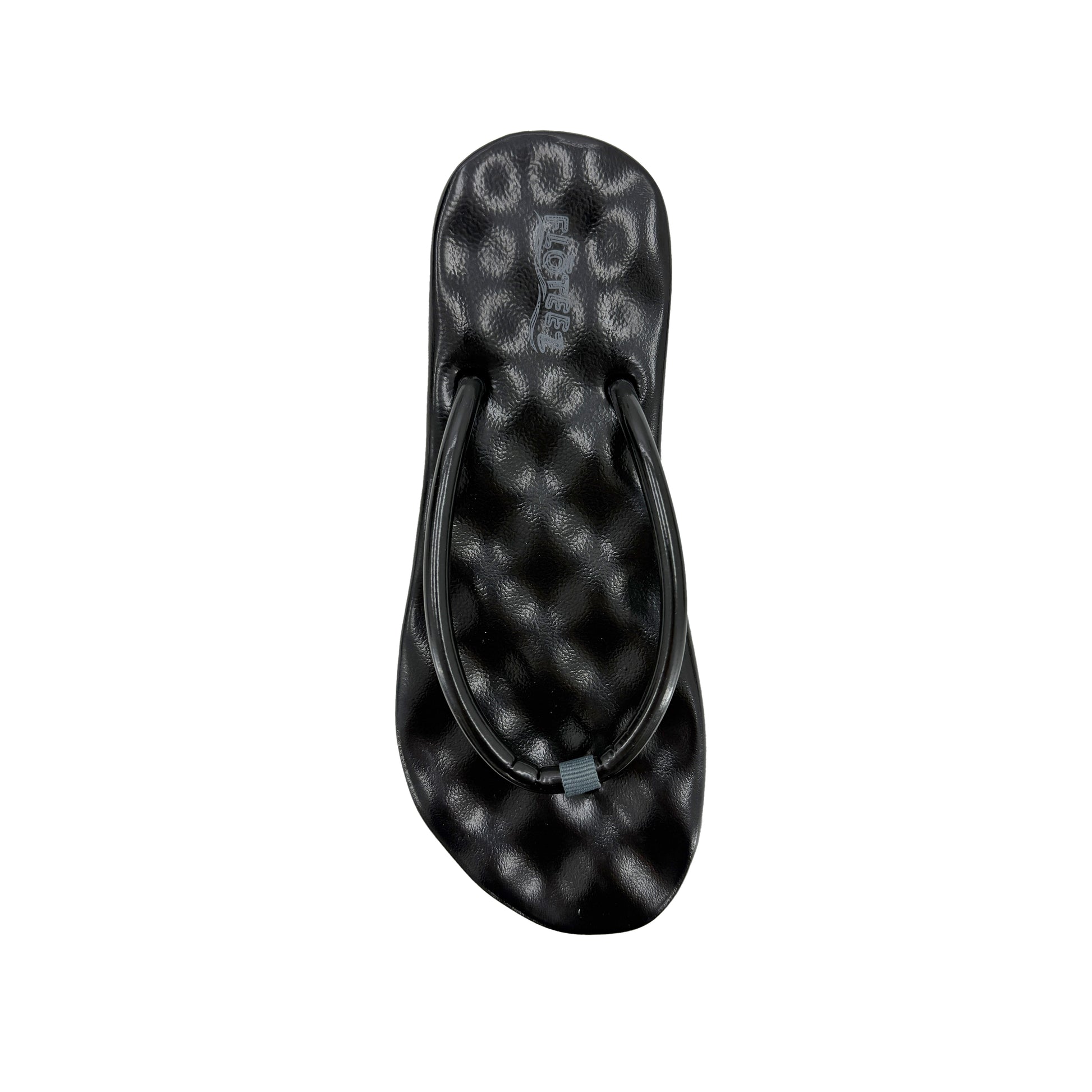 Black flip-flop sandal with a pattern on a white background