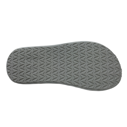 Gray shoe sole with textured pattern on a white background