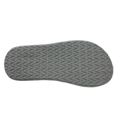 Gray sandal sole with textured pattern on a white background