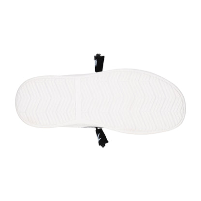 White shoe sole with black laces on a white background