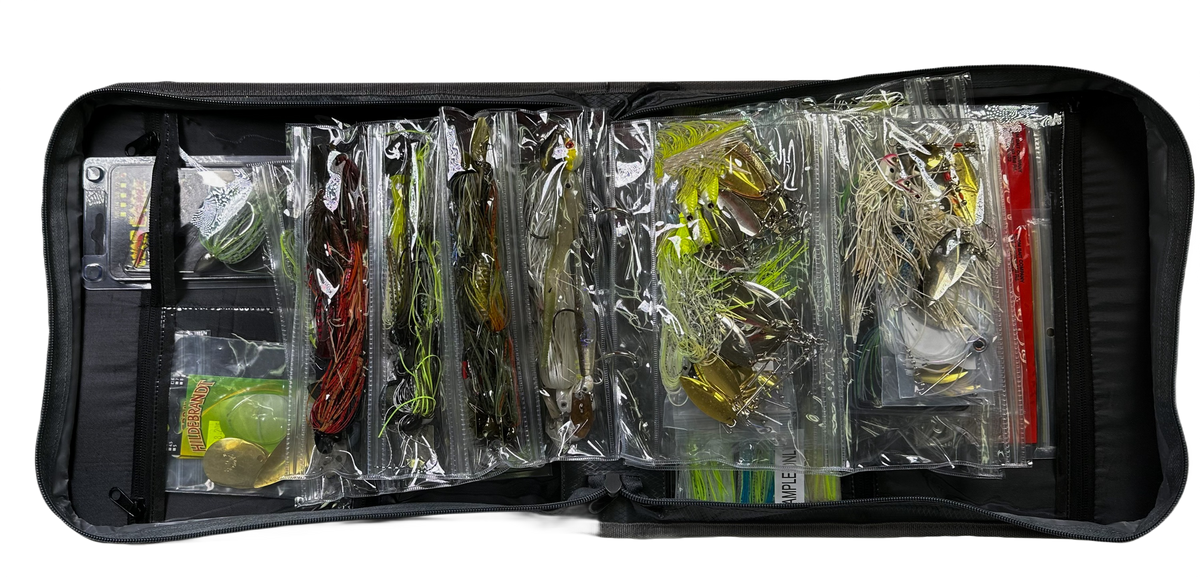 Fishing lure set in a Frogg Toggs black case on a white background.