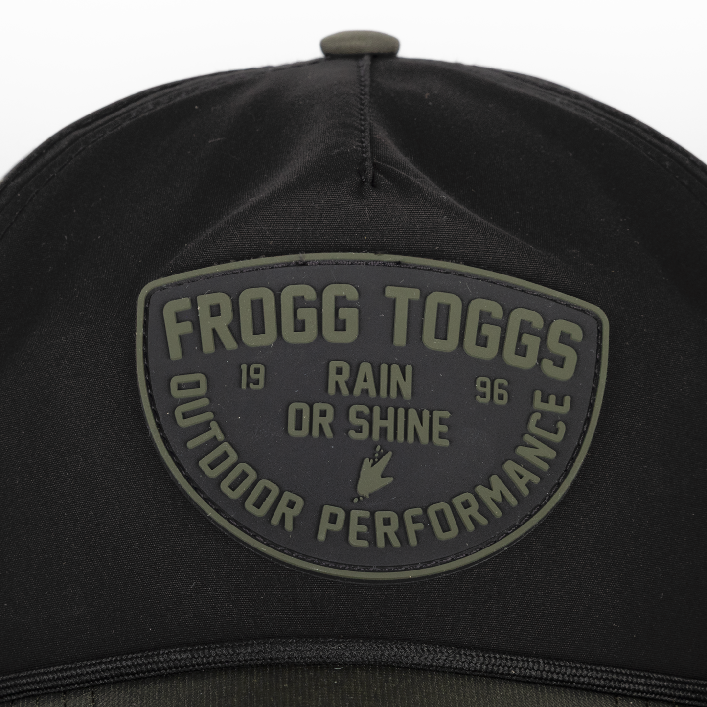 Black cap with Frogg Toggs logo and text on a white background