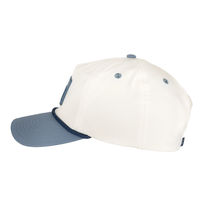 Two-tone cap with white front and blue hat on a white background