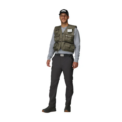 Man wearing a green vest and black pants on a white background