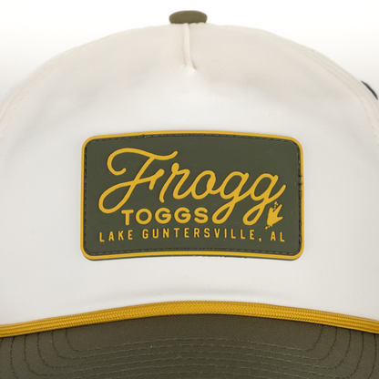 White cap with a green and yellow 'Frogg Toggs' logo on a white background