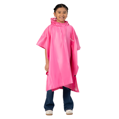 Child wearing a pink rain poncho on a white background
