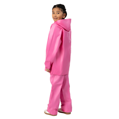 Child wearing a pink raincoat and pants on a white background