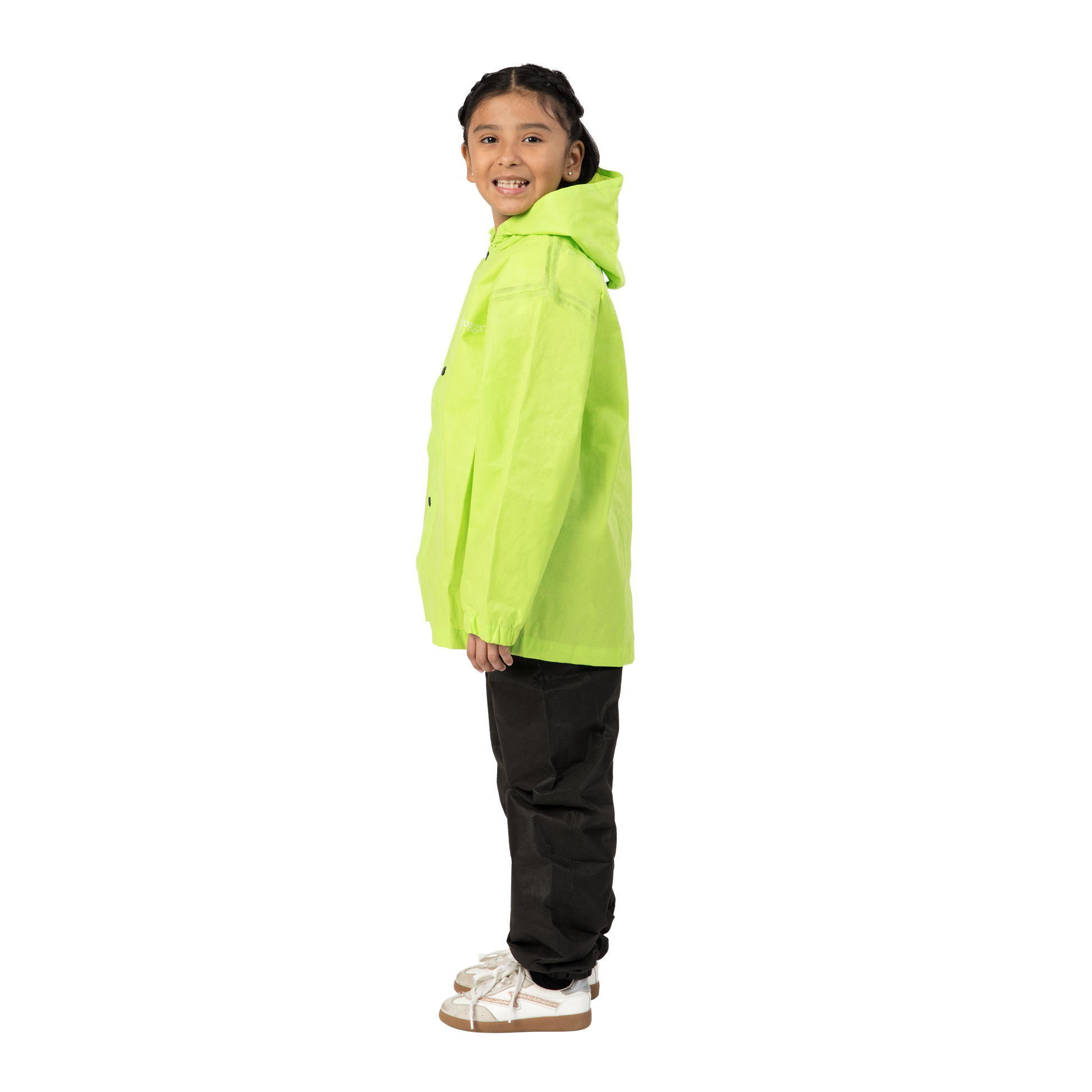 Child wearing a bright green raincoat on a white background