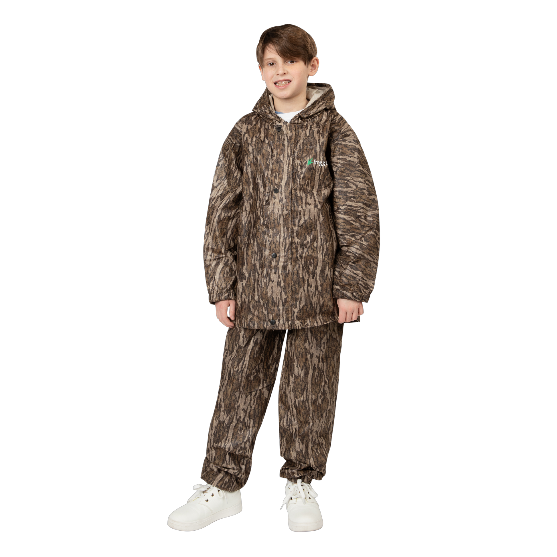 Child wearing a camouflage rain suit on a white background