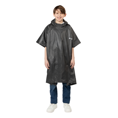 Child wearing a black rain poncho on a white background