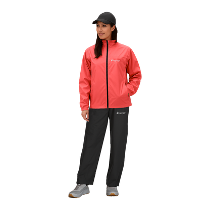 Person wearing a pink raincoat and black pants on a white background